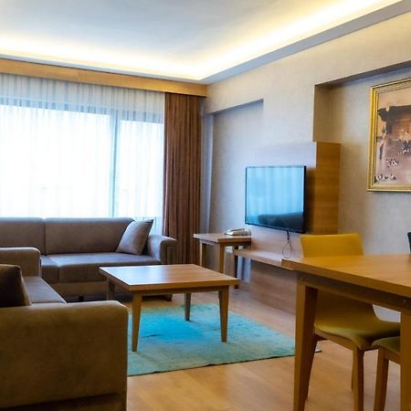 Bursa Suites Apart Otel Exterior foto A living room in a serviced apartment in Istanbul, Turkey