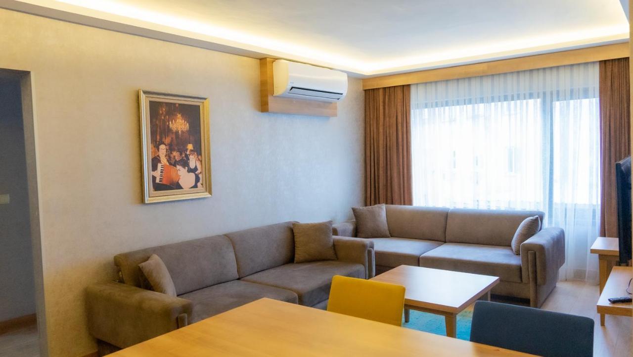 Bursa Suites Apart Otel Exterior foto A living room in a hotel