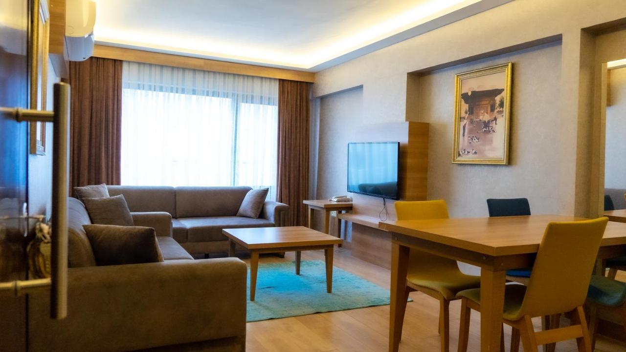 Bursa Suites Apart Otel Exterior foto A living room in a serviced apartment in Istanbul, Turkey