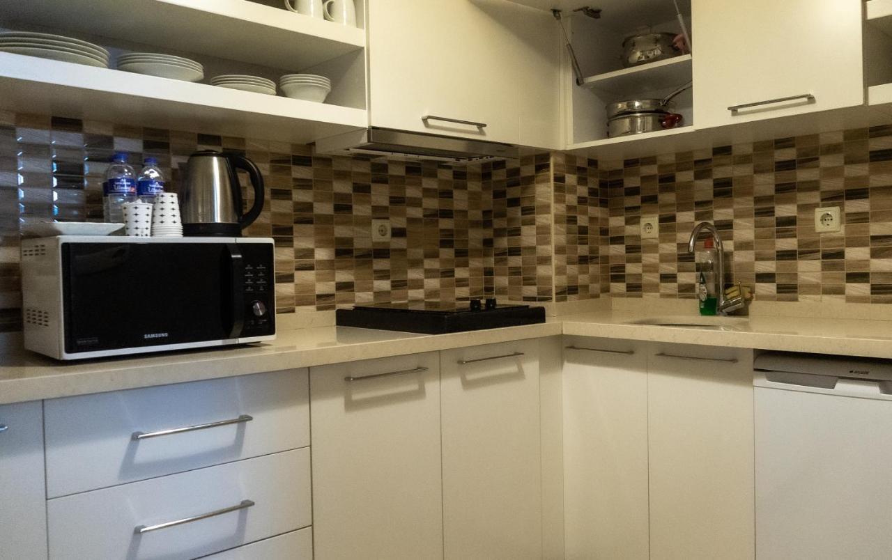 Bursa Suites Apart Otel Exterior foto A typical kitchen in a student apartment