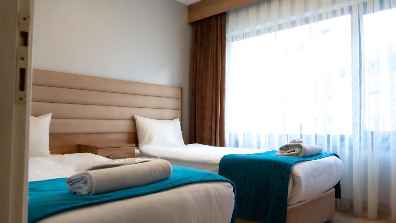 Bursa Suites Apart Otel Exterior foto A room at the hotel