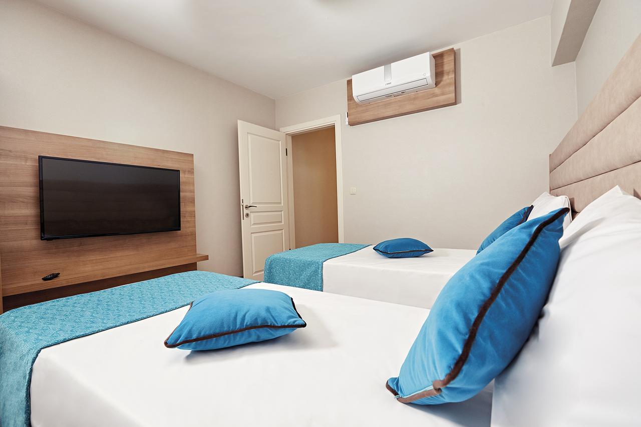 Bursa Suites Apart Otel Exterior foto A bedroom at the hotel
